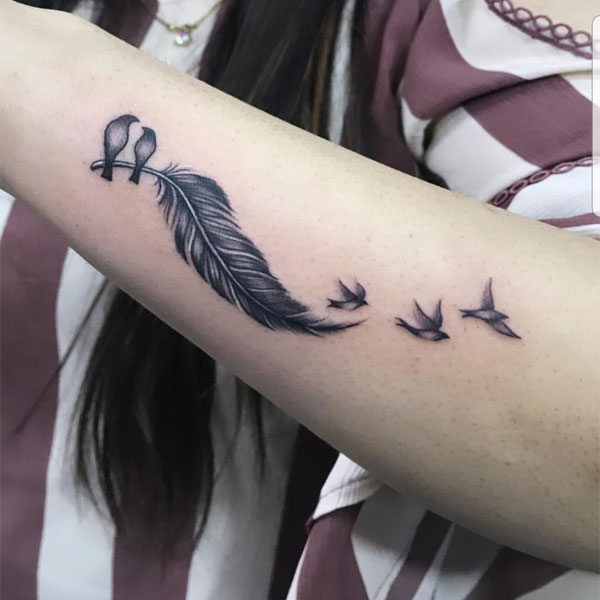  Small Birds with feather tattoo