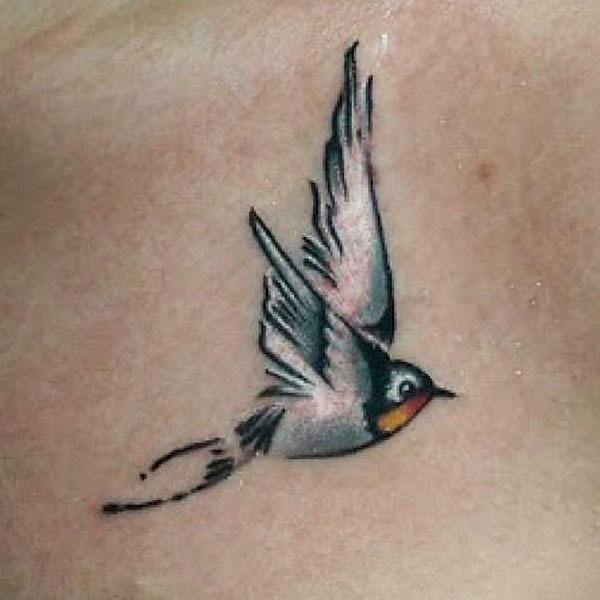  A small detailed sparrow tattoo