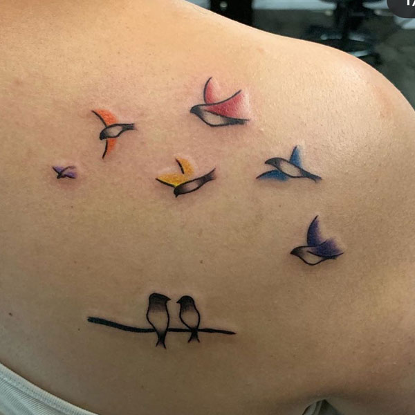 Beautiful birds tattoo on back shoulder