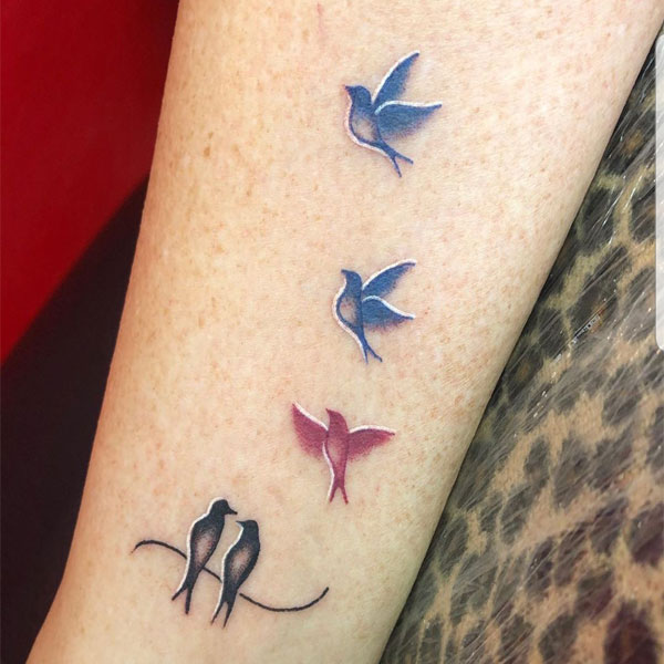 Small colorful tattoo of Birds