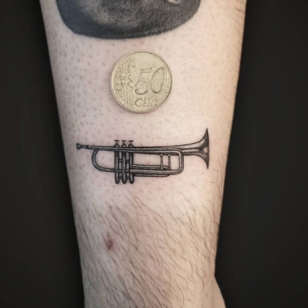 Beautiful Trumpet small tattoo for hand