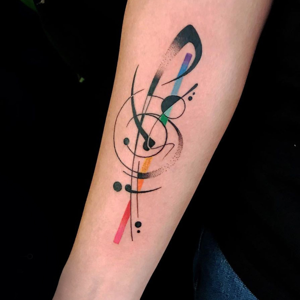  Geometrical colorful musical symbol tattoo