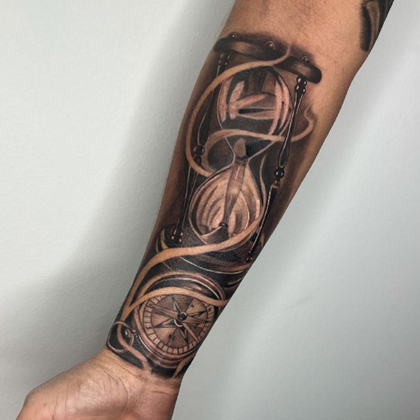 Awesome compass and shading hourglass tattoo