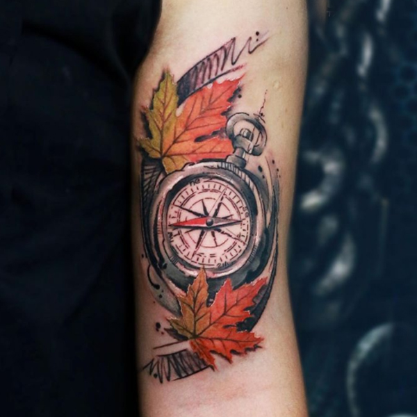 Fabulous compass and maple leaf colorful tattoo