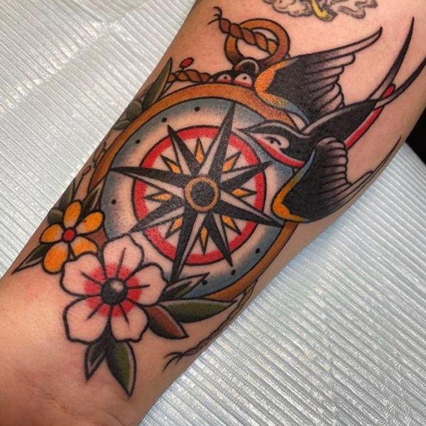 Dazzling compass old-school tattoo