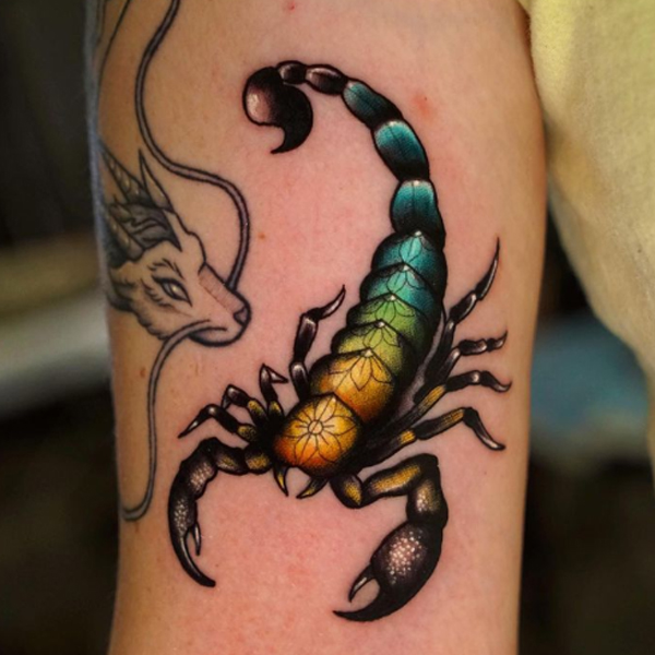 Stunning metallic color Scorpio tattoo design