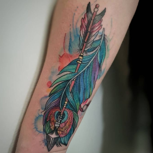 Awesome Arrow peacock feather tattoo