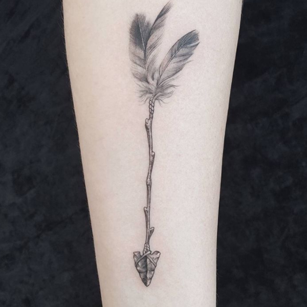 Creative arrow stick style tattoo design