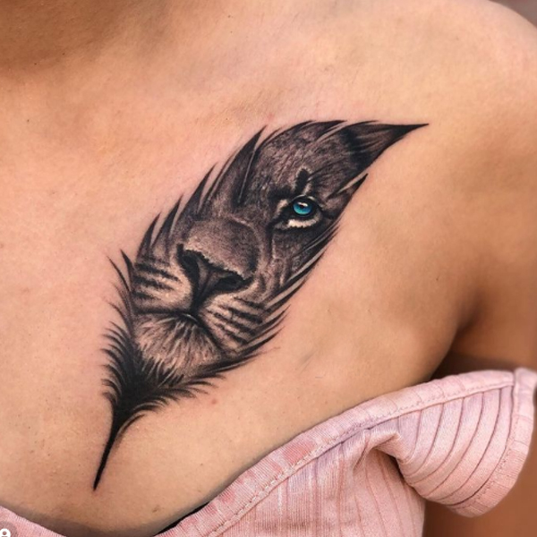 Pretty lion feather-style tattoo