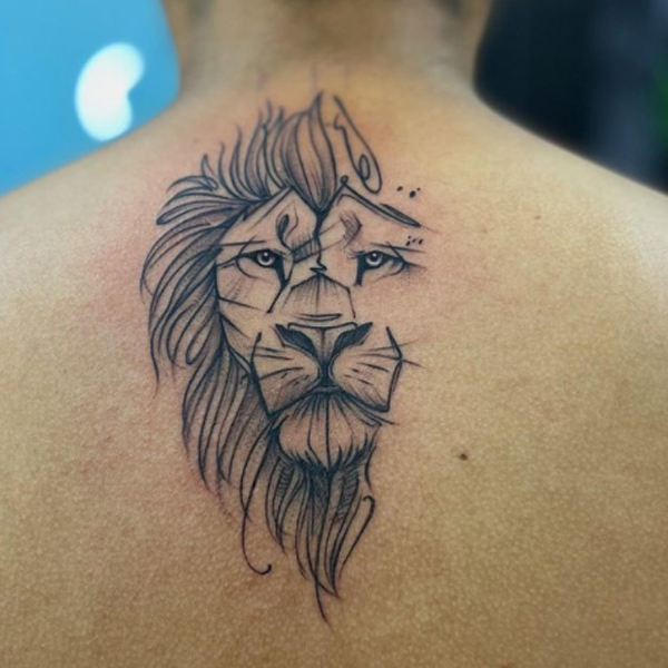 Stunning fine line of lion face on the back