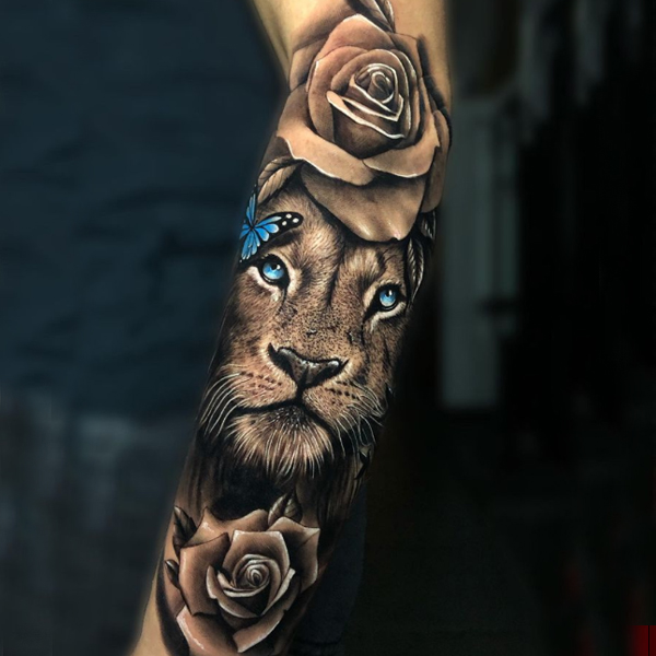 Awesome lion, rose, and butterfly tattoo design