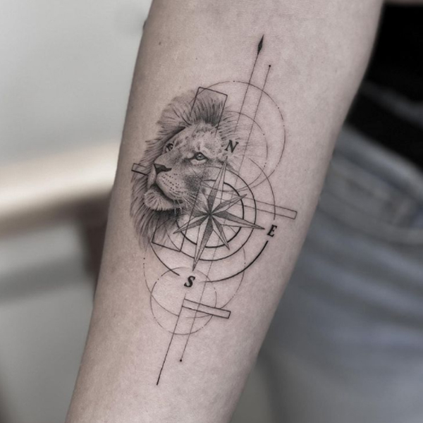 Pretty realistic lion and compass tattoo design