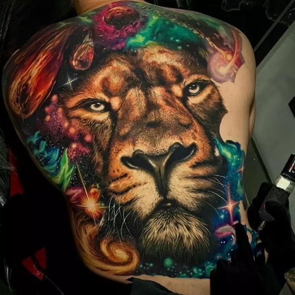 Splendid full-back lion and universe tattoo