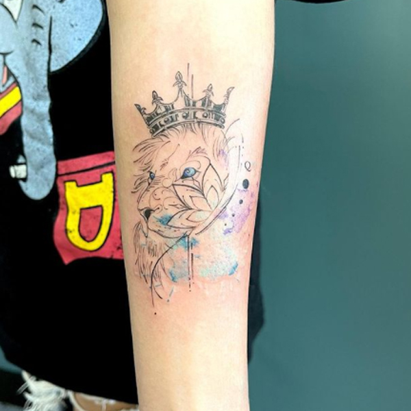 Pretty fine line lion with crown and flower tattoo