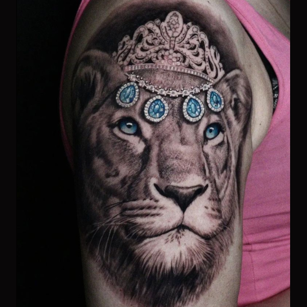 Attractive lion with stone crown tattoo